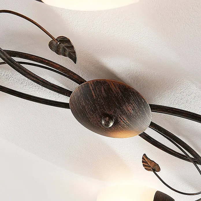 Lindby Deckenleuchte Stefania - braun / rost, E14 - Dekorative Deckenleuchte in Antik-Bronze mit geschwungenen Metallarmen und Blätterakzenten.