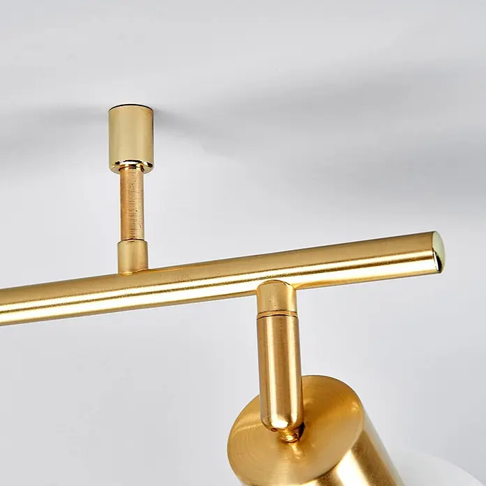 Lindby Deckenleuchte Elaina - messing / gold, E14 - Goldfarbene Metall-Schienenleuchte mit verstellbarem Strahler, an der Decke montiert.