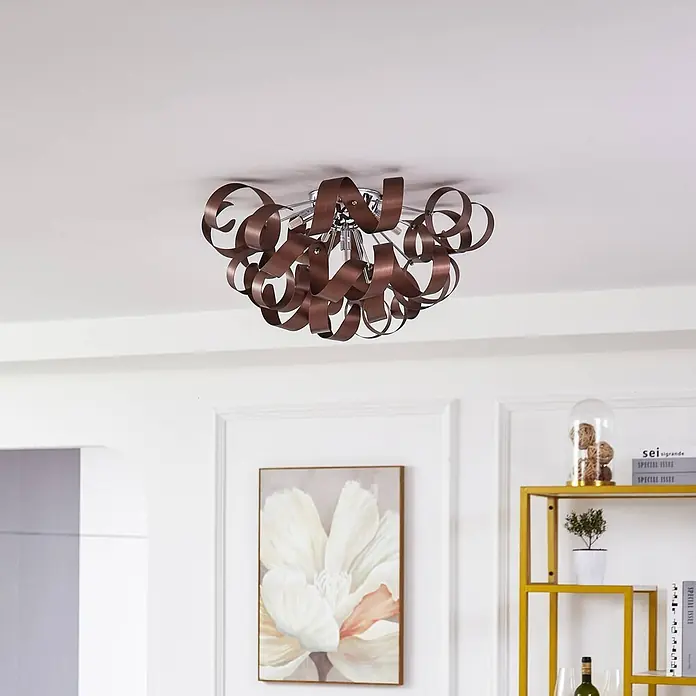 Lucande Deckenleuchte Kaelor - kupfer, G9 - Bronze-farbene Deckenleuchte mit wellenförmigen Metallbändern und Chromsockel, an der Decke montiert.