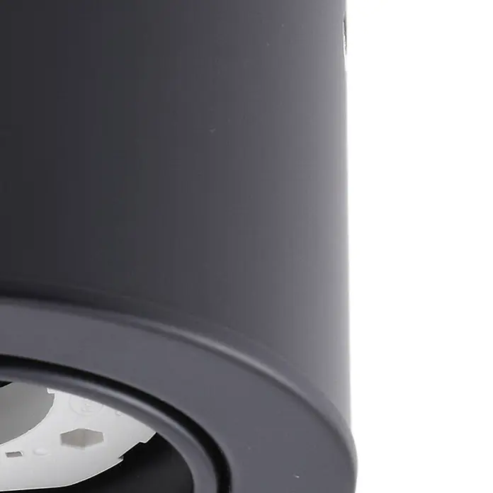 Lindby Deckenlampe in schwarz matt, Deckenleuchte -  - Dunkelgraues zylindrisches Gehäuse, möglicherweise für einen Einbaustrahler, mit sichtbaren weißen Innenteilen.