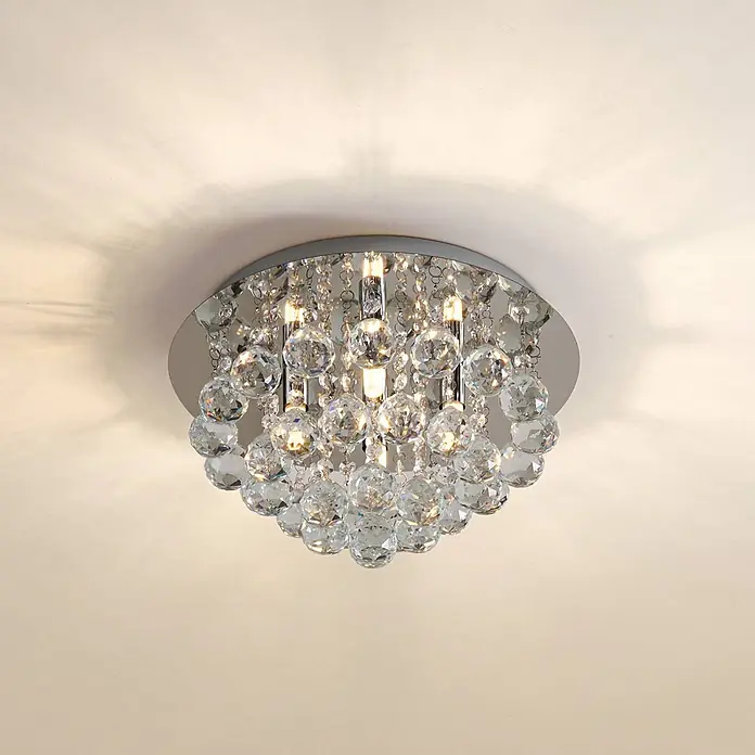 Lindby Deckenleuchte Antonino - chrom / silber, klar / transparent, G9 - Funkelnde Kristall-Deckenleuchte mit Chromsockel, beleuchtet und Licht an die Decke werfend.