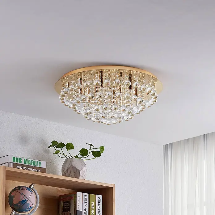 Lindby Deckenleuchte Gillion - L x B x H: 55 x 55 x 23,5 cm, messing / gold, klar / transparent, G9 - Elegante goldfarbene Deckenleuchte mit zahlreichen klaren Kristallkugeln, die einem Raum Glanz verleiht.