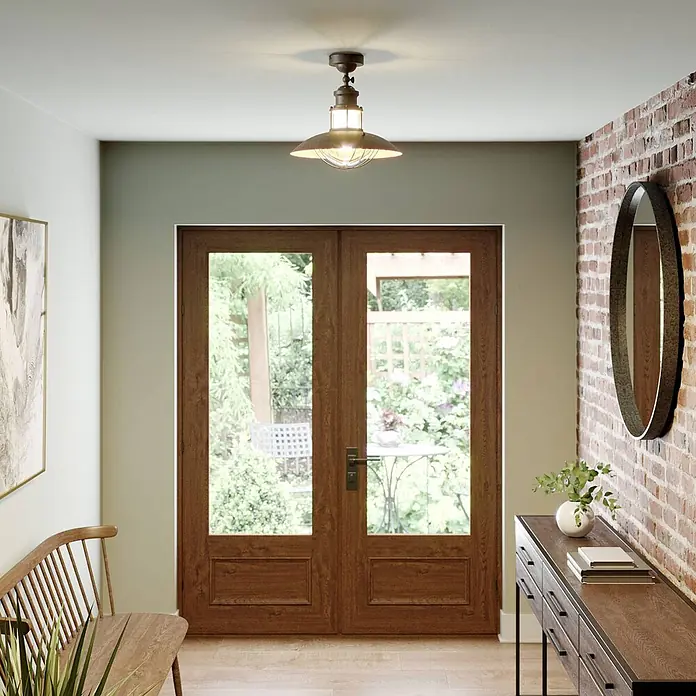 Lindby Deckenleuchte Louisanne - L x B x H: 35 x 35 x 34,5 cm, braun / rost, braun / rost, E27 - Eine industrielle Deckenleuchte im Semi-Flush-Mount-Stil mit dunklem Bronzefinish und Klarglasschirm beleuchtet einen Eingangsbereich.