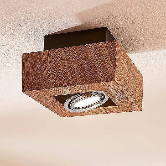 Arcchio Deckenstrahler Vince - Holz hell, Holz hell, GU10 - Deckenstrahler aus Holz mit dunkelbraunem Sockel und ovaler LED-Leuchte mit Chromrahmen, nach unten gerichtet.