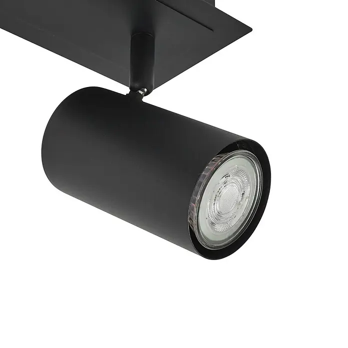 Lindby Deckenstrahler Joffrey - schwarz, schwarz, GU10 - Schwarzer zylindrischer Strahler mit sichtbarer LED-Birne, auf einer flachen Basis montiert.