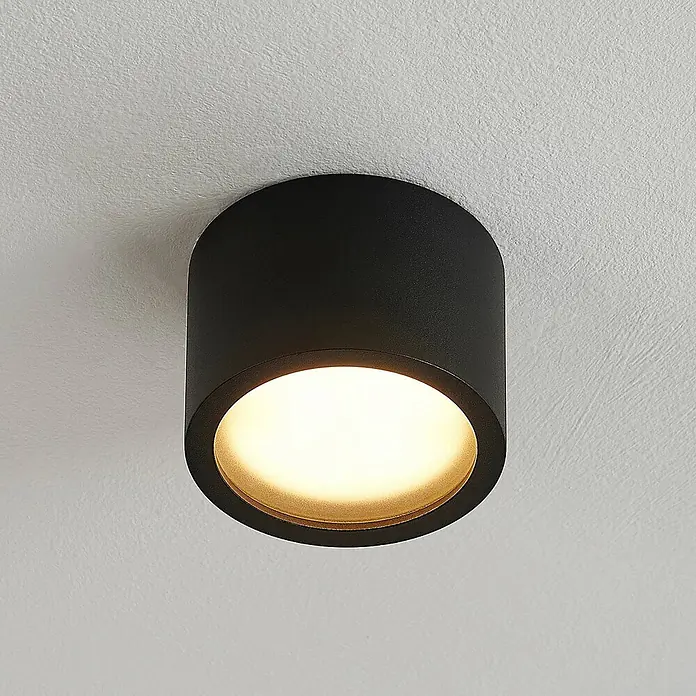 Arcchio Deckenstrahler Nieva - L x B x H: 10 x 10 x 6,5 cm, schwarz, schwarz, 2GX53 - Schwarze zylindrische Deckenleuchte mit warmweißem Licht.