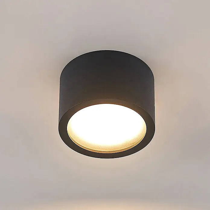 Arcchio Deckenstrahler Nieva - L x B x H: 10 x 10 x 6,5 cm, schwarz, schwarz, 2GX53 - Dunkelgraue zylindrische Deckenleuchte mit warmweißem Licht.