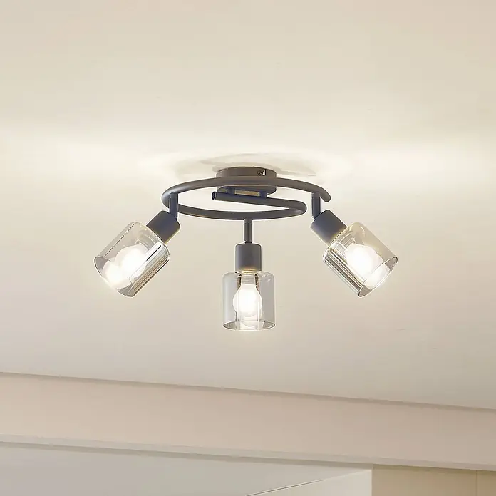 Lindby Deckenstrahler Netty - schwarz, alu / grau / zink, E14 - Anthrazitfarbener Deckenstrahler mit drei klaren Glasschirmen auf spiralenförmigem Metallrahmen.