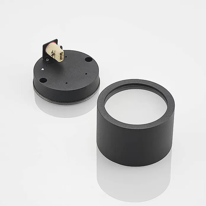 Arcchio Deckenstrahler Nieva - L x B x H: 10 x 10 x 6,5 cm, schwarz, schwarz, G9 - Zwei schwarze Leuchtenkomponenten: eine runde Basis mit elektrischem Anschluss und ein zylindrisches Gehäuse.