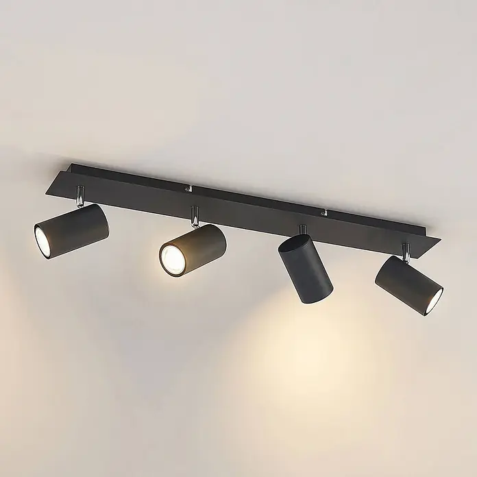 Lindby Deckenstrahler Joffrey - schwarz, schwarz, GU10 - Schwarze Deckenstrahlerleiste mit vier verstellbaren zylindrischen Leuchten. Zwei Lichter spenden warmes Licht.