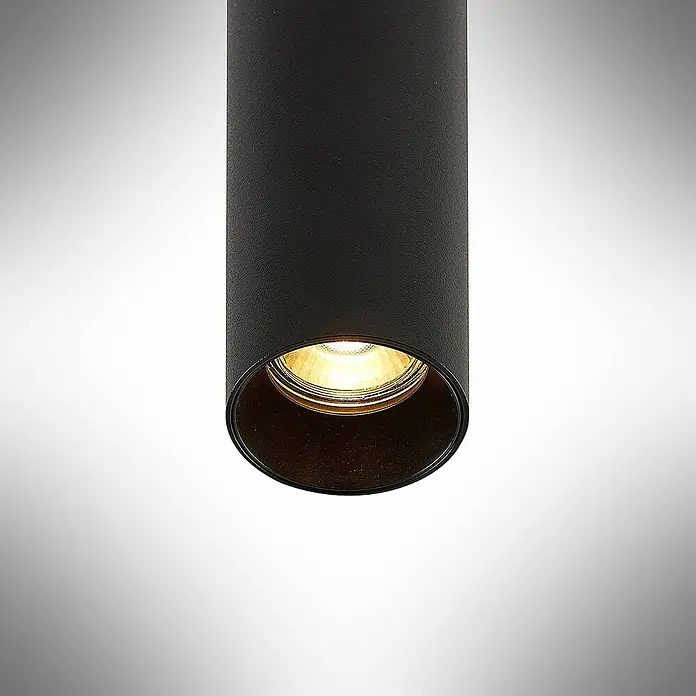 Arcchio Pendelleuchte Ejona - schwarz, Schwarz, GU10 - Schwarzer zylindrischer Strahler mit texturierter Oberfläche, der warmes Licht abgibt.