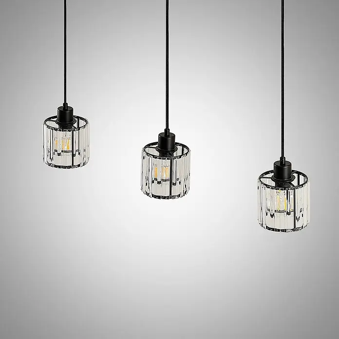 Lindby Pendelleuchte Vella - L x B x H: 83 x 13 x 12,3 cm, klar / transparent, mattSchwarz, transparent, E27 - Drei elegante Kristall-Pendelleuchten mit schwarzen Akzenten und sichtbaren Glühfäden.