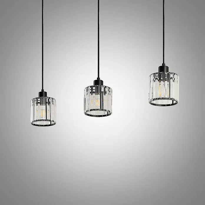 Lindby Pendelleuchte Vella - L x B x H: 83 x 13 x 12,3 cm, klar / transparent, mattSchwarz, transparent, E27 - Drei moderne Pendelleuchten aus schwarzem Metall und geriffeltem Klarglas mit sichtbaren Glühfadenlampen.