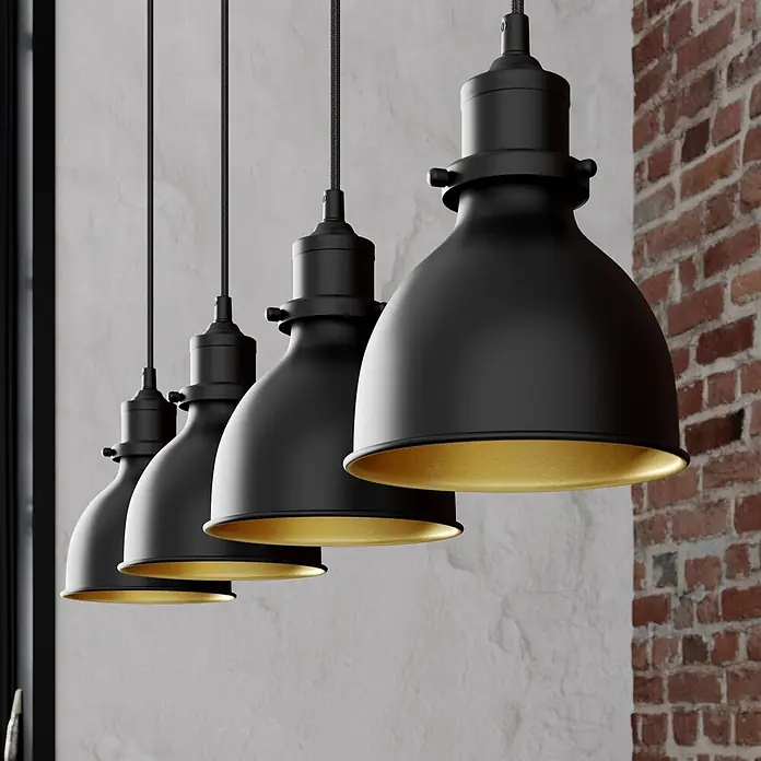 Lindby Pendelleuchte Jasminka - L x B x H: 97,5 x 15,5 x 20 cm, schwarz, Schwarz, gold, E27 - Vier schwarze Pendelleuchten mit goldener Innenseite hängen an einer strukturierten Wand.