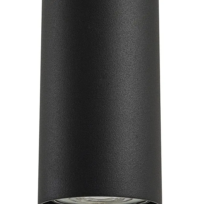 Lindby Pendelleuchte Joffrey - schwarz, Schwarz, GU10 - Schwarz, texturierte zylindrische Leuchte mit sichtbarer Lichtquelle an der Basis.