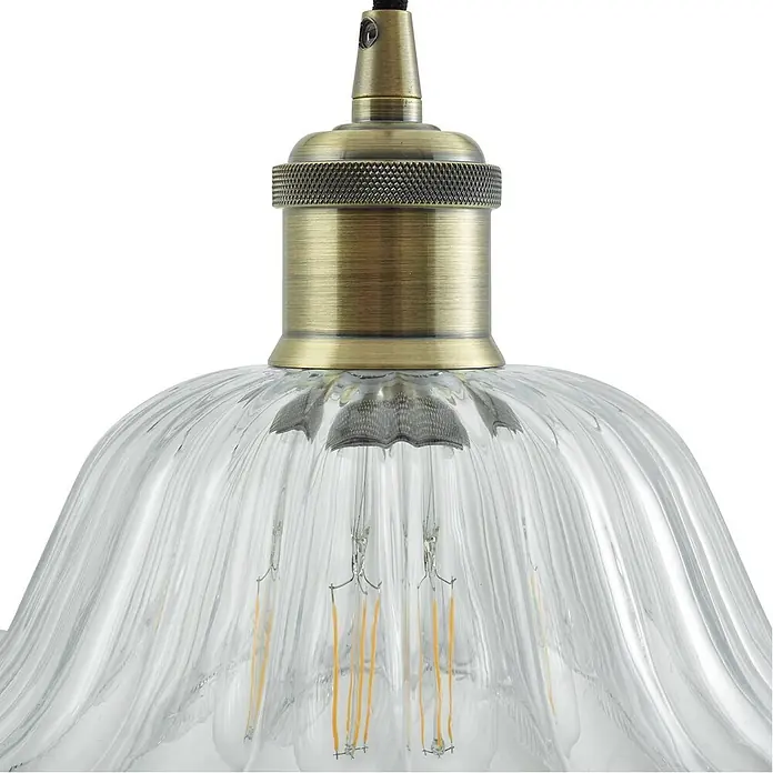 Lindby Pendelleuchte Ludowika - klar / transparent, transparent, messing, Schwarz, E27 - Pendelleuchte mit antikem Messingbeschlag, geripptem Klarglasschirm und sichtbarer LED-Glühbirne.