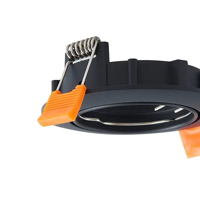 Prios Einbauleuchte Fibur - Ø x H: 8,2 x 2,8 cm, schwarz - Schwarzes Einbaustrahlergehäuse mit silbernen Federklemmen und orangefarbenen Laschen.