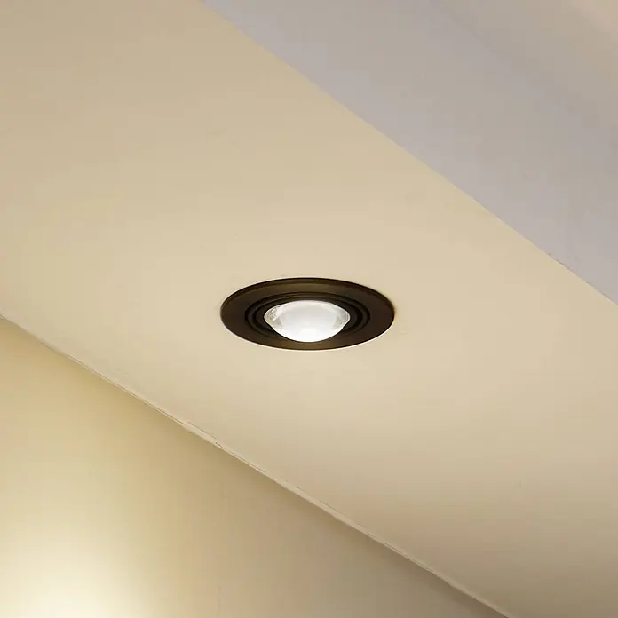 Lindby Einbauleuchte Jyla - Ø x H: 13 x 5,5 cm, schwarz - Einbau-Deckenleuchte mit dunkelbronzenem Rahmen und klarer, kuppelförmiger Glühbirne.