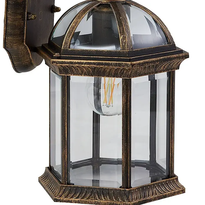 Lindby Außenwandleuchte Adelisa - bronze / altmessing, bronze / altmessing, IP44 - Sechseckige Bronze-Gold-Wandlaterne mit klaren Glaspaneelen und LED-Glühbirne. Klassische Außenleuchte.