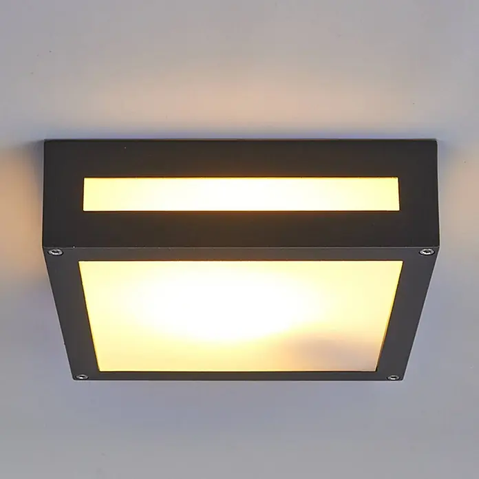 Lucande Außenwand- & Deckenleuchte Nerea - schwarz, schwarz, IP54 - Schwarze quadratische Deckenleuchte mit zwei warmgelben Lichtquellen: einem horizontalen Streifen und einem Hauptdiffusor.