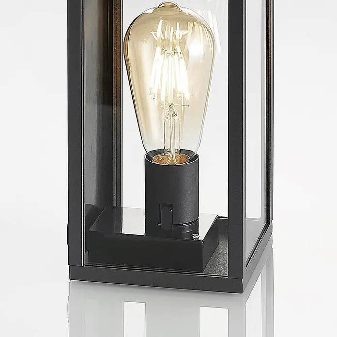 Lindby Außenwandleuchte Filimon - 12 x 12 x 22 cm, schwarz, schwarz, IP44 - Schwarze Außenleuchte mit Klarglas und beleuchteter bernsteinfarbener LED-Filamentbirne.