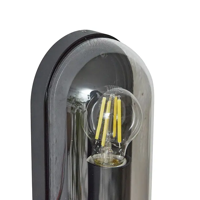 Lucande Außenwandleuchte Serine - schwarz, klar / transparent, IP65 - Dunkelgraue Außenwandleuchte mit klarer Glaskuppel und sichtbarer LED-Glühbirne.