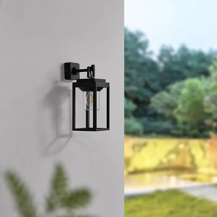 Lucande Außenwandleuchte Milanka - schwarz, schwarz, IP65 - Schwarze Außenwandleuchte mit Klarglas und LED-Birne.