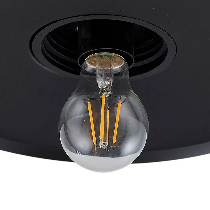 Lindby Außenwandleuchte Bilma - 39,5 x 27,5 x 29 cm, braun / rost, IP44 - Nahaufnahme einer schwarzen Einbau-Deckenleuchte mit freiliegender, klarer LED-Filamentbirne und warmgelben Filamenten.