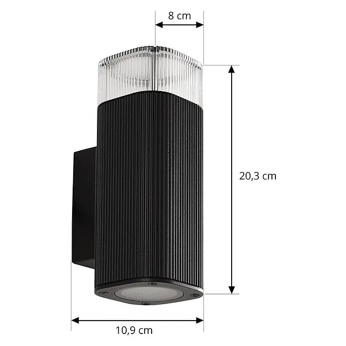 Lindby Außenwandleuchte Halvar - 8 x 11 x 20,5 cm, schwarz, klar / transparent, IP65 - Schwarze gerippte Wandleuchte mit klarem, gerilltem Oberteil, 10,9 cm breit, 8 cm tief und 20,3 cm hoch.
