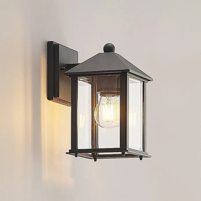 Lindby Außenwandleuchte Giavanna - 18,2 x 14 x 23,3 cm, schwarz, schwarz, IP43 - Schwarze Außenwandlaterne mit klaren Glasscheiben und freiliegender Glühbirne.