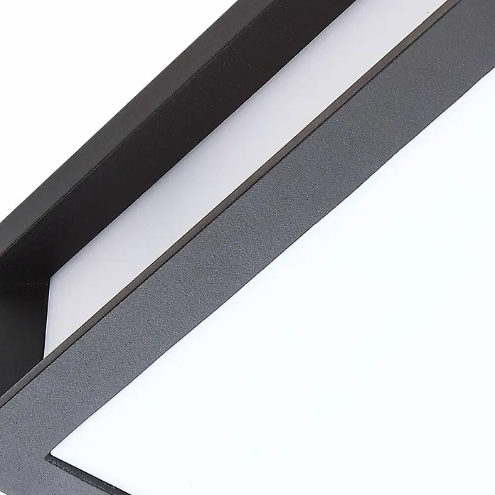 Lindby Außenwandleuchte Sivana - schwarz, schwarz, IP44 - Schwarze, lineare LED-Leuchte mit strukturierter Oberfläche und weißem Leuchtpaneel.