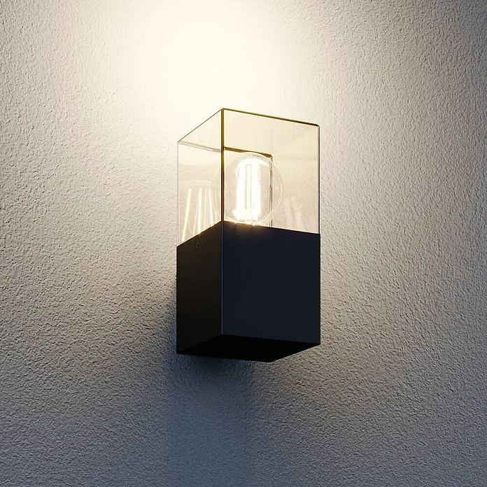Lucande Außenwandleuchte Keke - schwarz, schwarz, IP44 - Moderne schwarze und klare Glas-Wandleuchte mit leuchtender Glühbirne.
