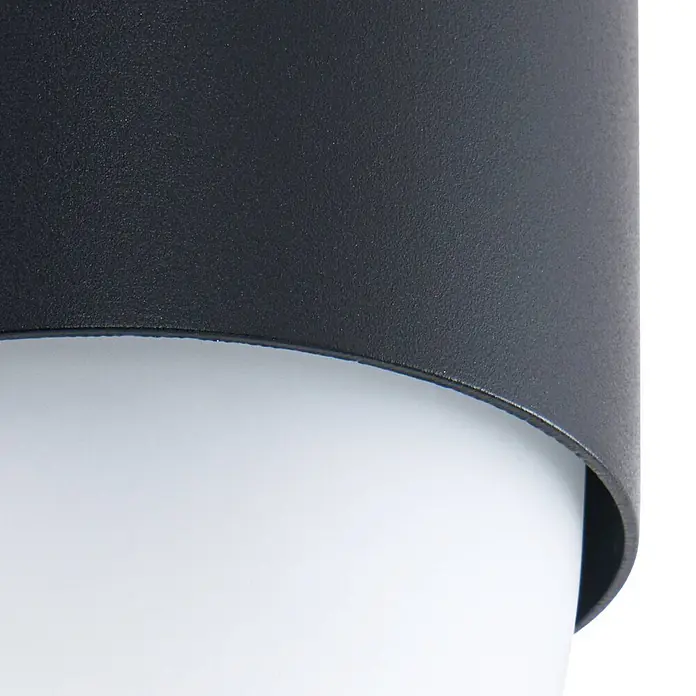 Lindby Wandleuchte aussen in schwarz, weiß, Aussenlampe Wand -  - Dunkelgraue, texturierte zylindrische Leuchte mit weißem Diffusor.
