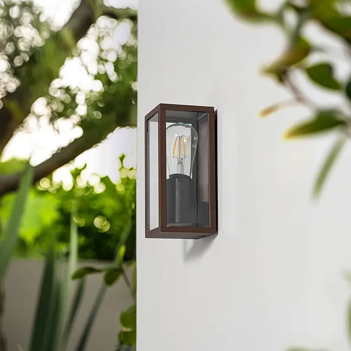 Lindby Außenwandleuchte Robigus - braun / rost, braun / rost, IP54 - Braune Metall- und Klarglas-Außenwandleuchte mit Filament-LED-Birne.