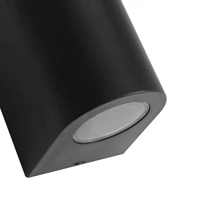 Prios Außenwandleuchte Irfan - 8,9 x 6,8 x 10 cm, schwarz, IP44 - Schwarze zylindrische Außenleuchte mit mattem Finish und ovalem, lichtdurchlässigem Diffusor.