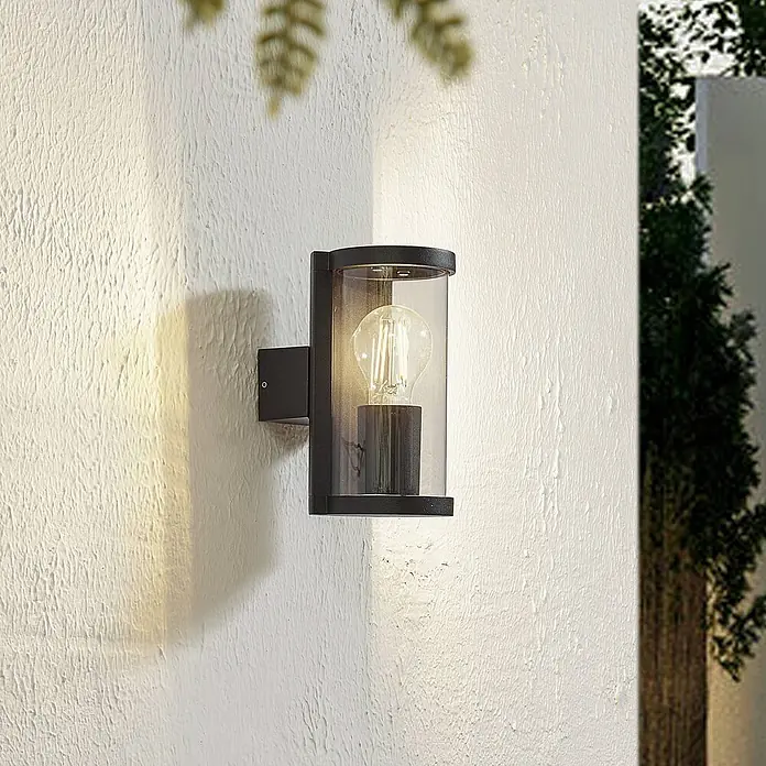 Lucande Außenwandleuchte Zanta - schwarz, alu / grau / zink, IP65 - Schwarze Außenwandleuchte mit klarem Glaszylinder und sichtbarer Glühbirne.