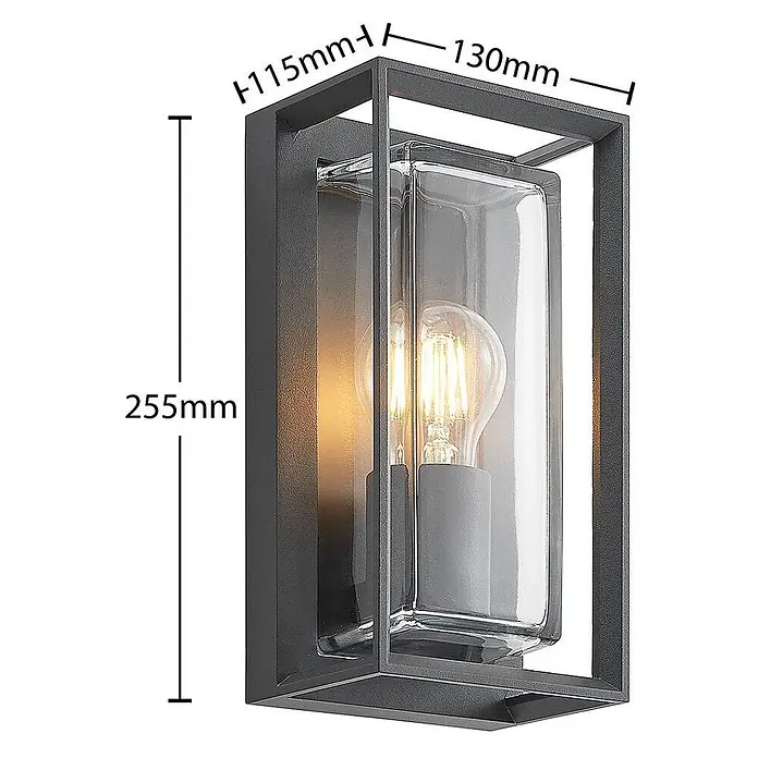 Arcchio Außenwandleuchte Ismera - schwarz, schwarz, IP65 - Anthrazitfarbene Außenwandleuchte mit rechteckigem Metallrahmen und klarem Glasdiffusor, zeigt eine Edison-Glühbirne.
