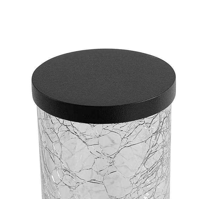 Lindby Außenwandleuchte Gavros - schwarz, klar / transparent, IP44 - Glasgefäß mit schwarzem Deckel und rissiger Glasstruktur.