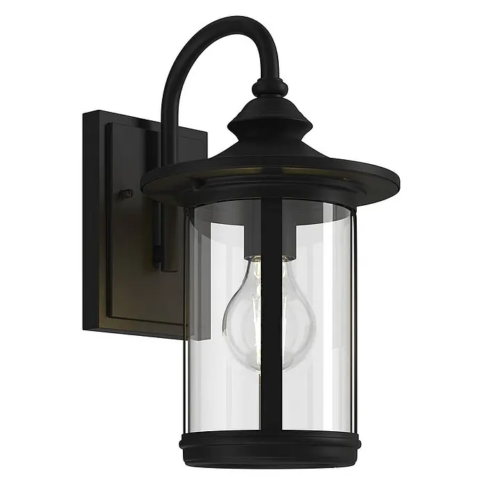 Lindby Außenwandleuchte Zayn - 23,8 x 19 x 33,4 cm, schwarz, IP23 - Schwarze Außenwandleuchte mit klarem Glasschirm und sichtbarer Glühbirne, an einer Wandhalterung montiert.