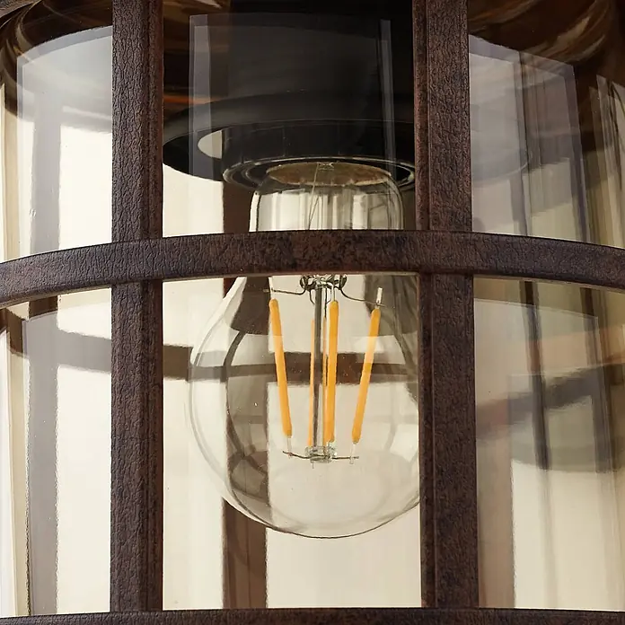 Lindby Wandleuchte aussen in rost, amber getönt, Aussenlampe Wand -  - Strukturierte dunkelbraune Metall-Leuchte mit bernsteinfarbenem Glas und Vintage-LED-Glühbirne.