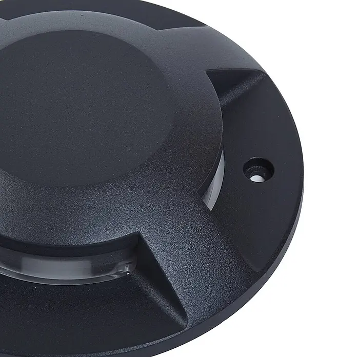 Lucande LED-Gartenstrahler Jeffrey - 3.000 K - Schwarze, texturierte, runde Bodeneinbauleuchte mit klaren Diffusoren und sichtbarer Montagebohrung.