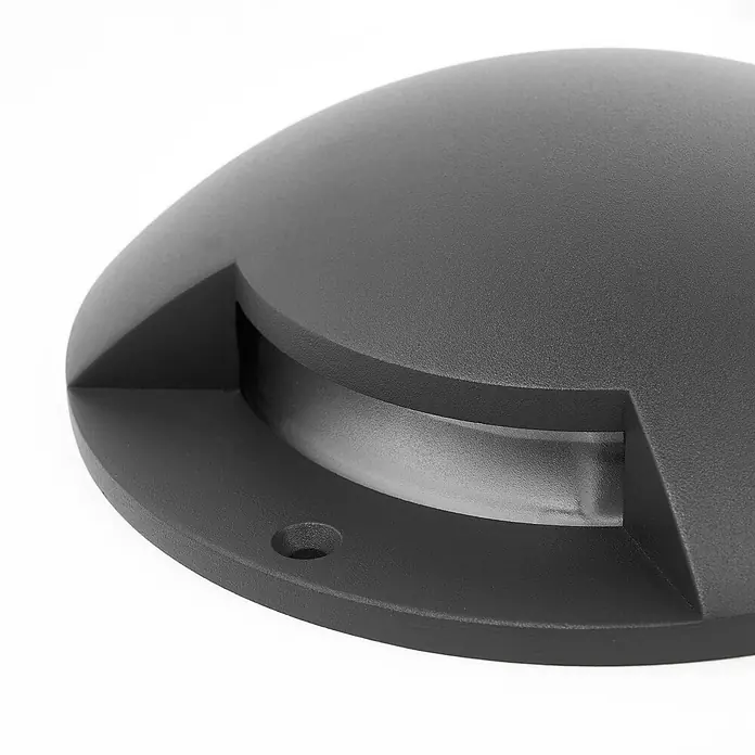 Lindby LED-Gartenstrahler Cormac - 3.000 K - Dunkelgraue runde Bodeneinbauleuchte mit gebogenem, mattem Diffusor und matter Textur.