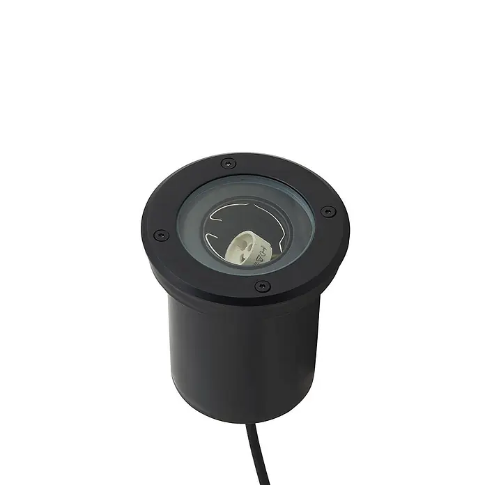Lindby LED-Gartenstrahler Cliff -  - Schwarze runde Bodeneinbauleuchte mit klarer Glasabdeckung, die eine weiße Lampenfassung und ein Kabel zeigt.
