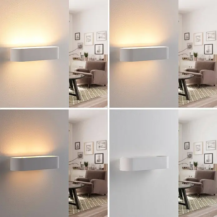 Lindby Wandleuchte Fioni - L x B x H: 10,5 x 30 x 6,5 cm, weiß / opal, G9 - Weiße ovale Wandleuchte, montiert, ausgeschaltet und in verschiedenen warmen Lichttemperaturen leuchtend.