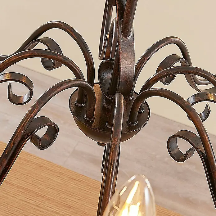 Lucande Kronleuchter Caleb - braun / rost, rostbraun, E14 - Dunkelbronzefarbene, kunstvolle Metallleuchte mit mehreren geschwungenen Armen und sichtbarer Glühbirne.