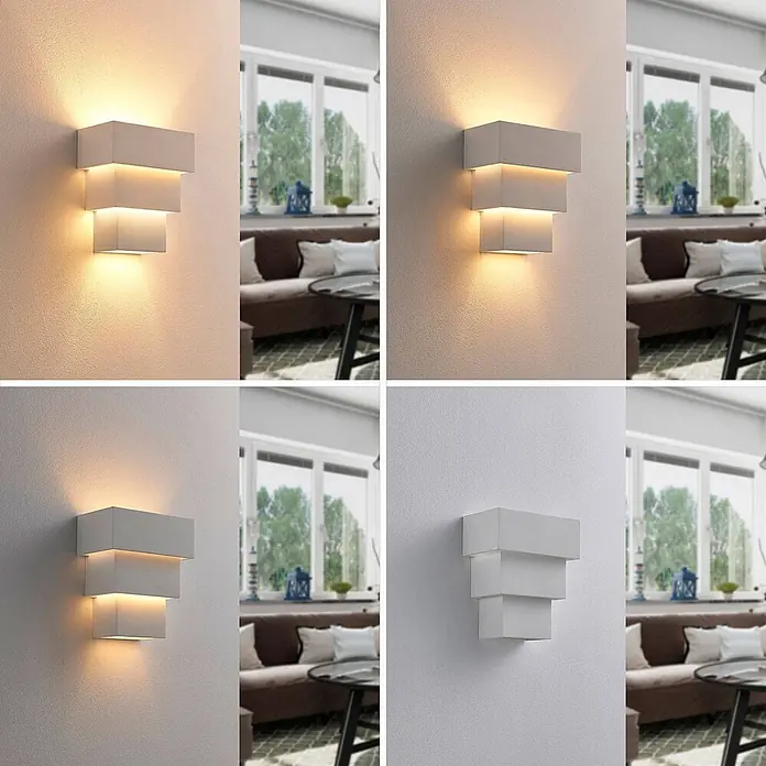 Lindby Wandleuchte Antonella - L x B x H: 10,5 x 18 x 21 cm, weiß / opal, G9 - Moderne weiße gestufte Wandleuchte an einer Wohnzimmerwand, zeigt warme, neutrale und ausgeschaltete Zustände.