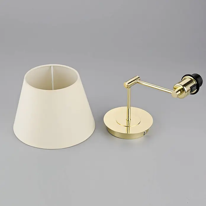 Lindby Wandleuchte Pola - messing / gold, creme / amber, E27 - Beiger konischer Stofflampenschirm und separater Wandleuchtenarm aus poliertem Messing mit Lampenfassung.