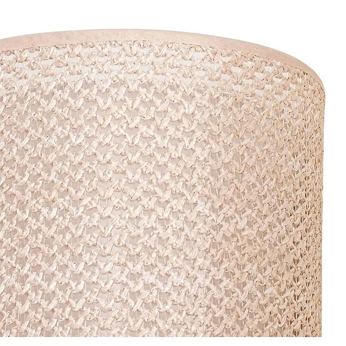 Lindby Wandleuchte Soula - L x B x H: 18 x 15 x 20 cm, creme / amber, E27 - Nahaufnahme eines hellbeigen Lampenschirms mit geflochtener Textur und glattem oberen Rand.