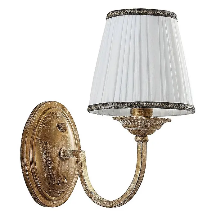 Lindby Wandleuchte Lumiel - bronze / altmessing, creme / amber, E14 - Vintage-Wandleuchte aus goldfarbenem Metall mit weißem plissiertem Stoffschirm und dunkler Borte.