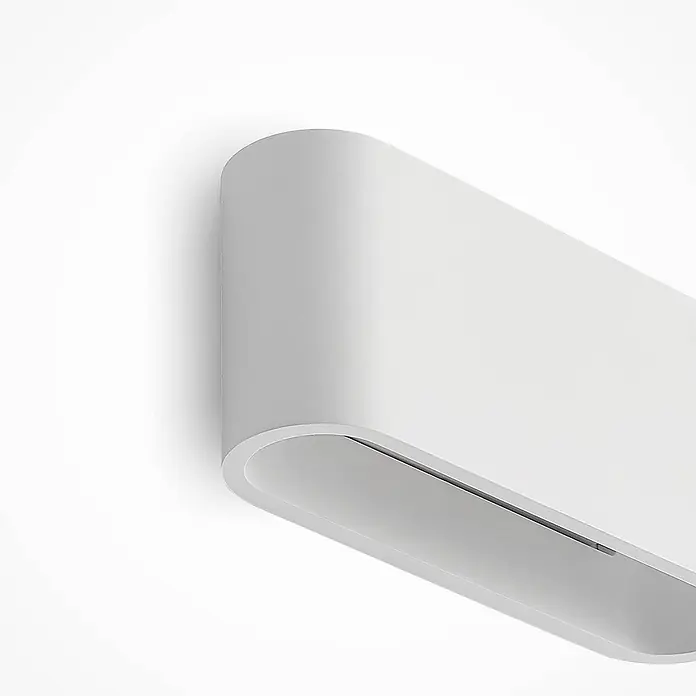 Lindby Wandleuchte Mavora - L x B x H: 7 x 25 x 12 cm, weiß / opal, G9 - Weiße, abgerundete rechteckige Wandleuchte mit einer vertieften Öffnung für indirekte Beleuchtung.